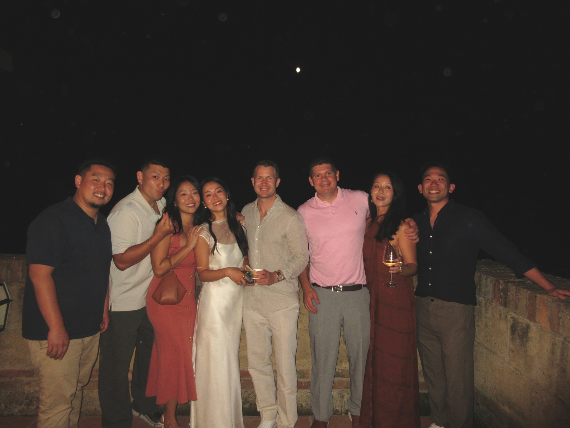 Tina celebrating with friends at night